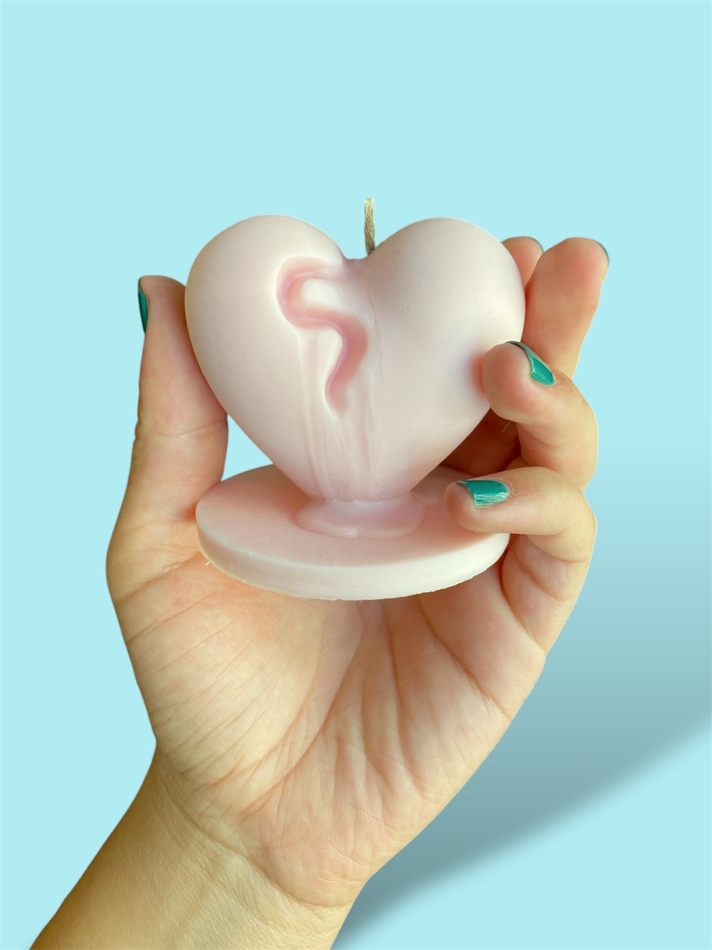 the melted heart candle