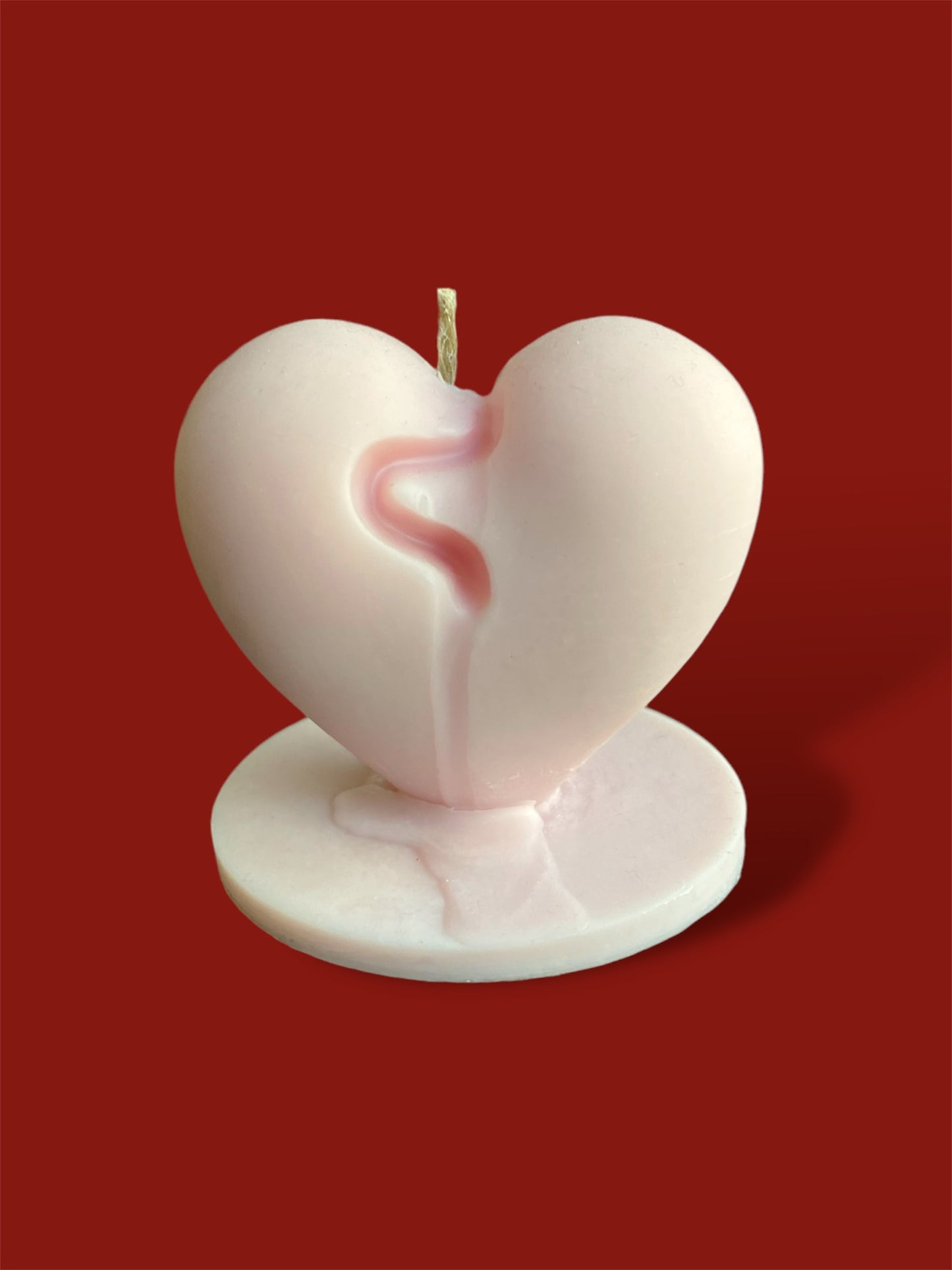 the melted heart candle