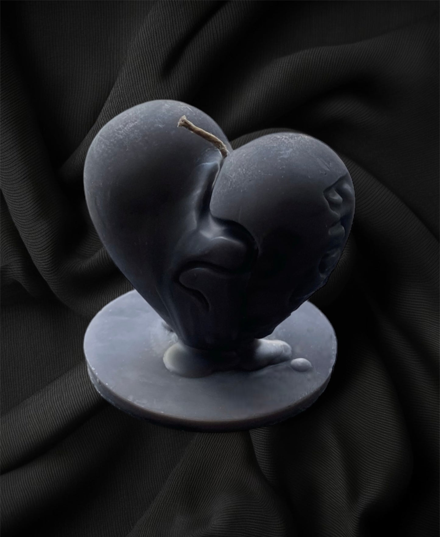 the melted heart candle